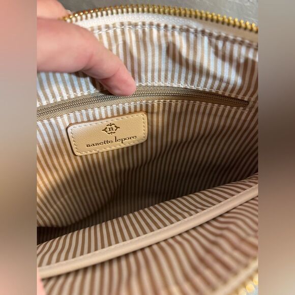 Nanette Lepore Tan Woven Bag with Gold Chain
White leather accents stripe lining - Picture 11 of 13